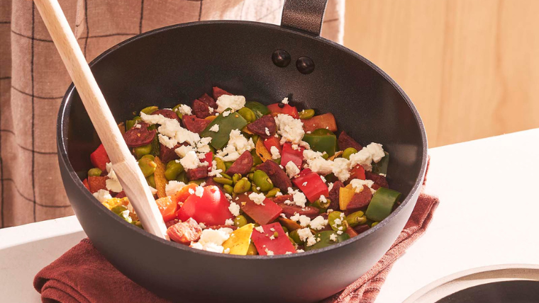 Sautéed broad beans, chorizo, and peppers, Iberian style.